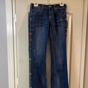 Cowgirl Tuff Co bootcut jeans with arrows down the sides. Size 27